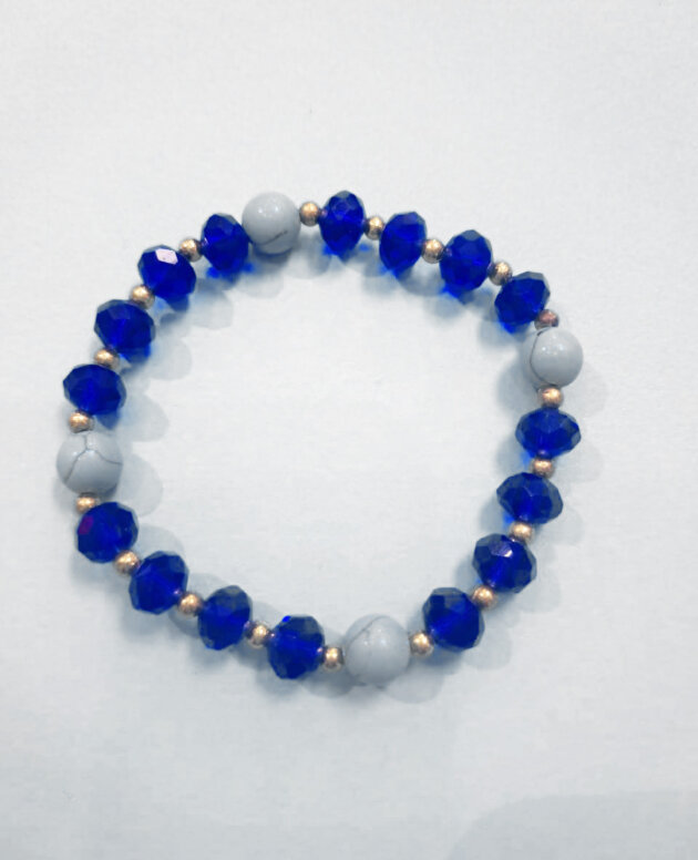 Turquoise agate and dark blue beads with small gold spacers
