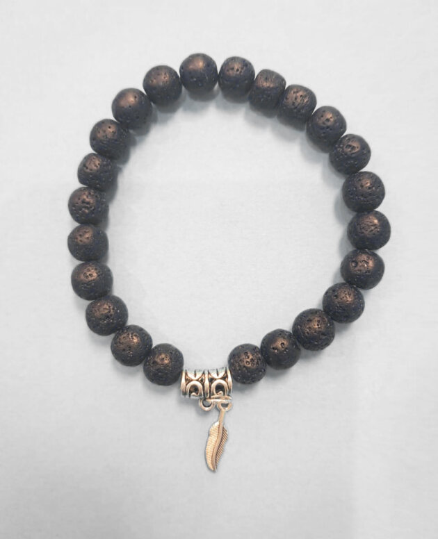 Diffuser lava bracelet with ornamental spacer and feather