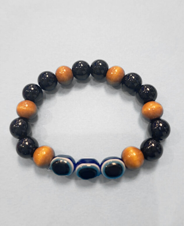 Evil eye bracelet with three eyes and black and wooden beads
