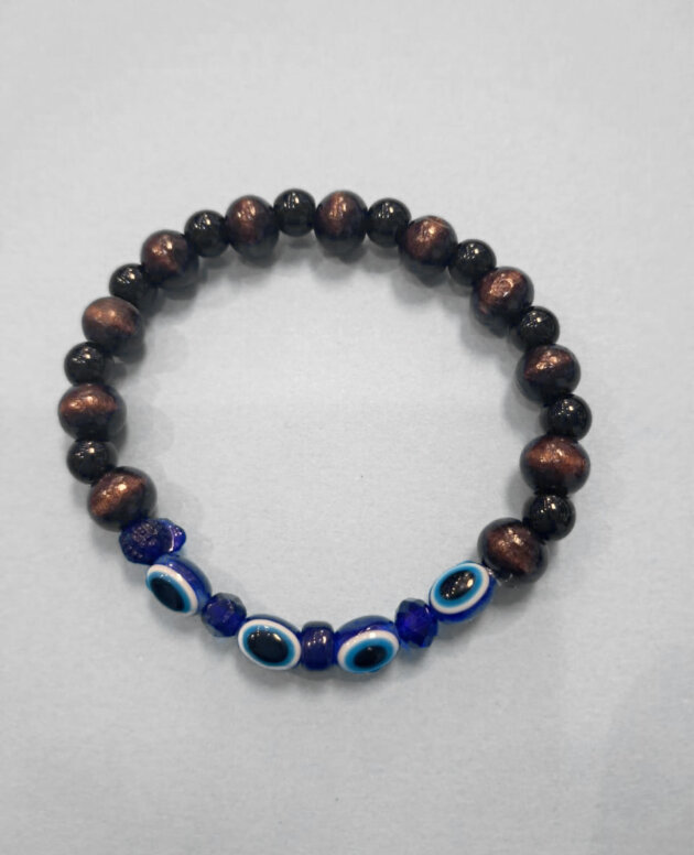 Evil eye bracelet with four eyes, small blue beads, small black beads and wooden beads