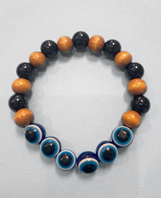 Evil eye bracelet with six eyes and black and wooden beads