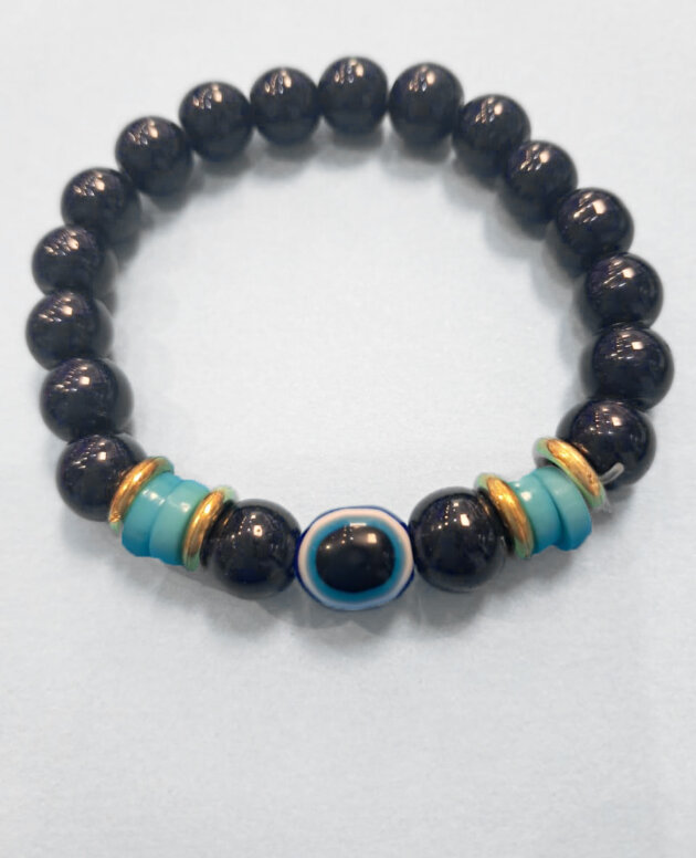 Evil eye bracelet with one eye, black beads, gold and turquoise spacers