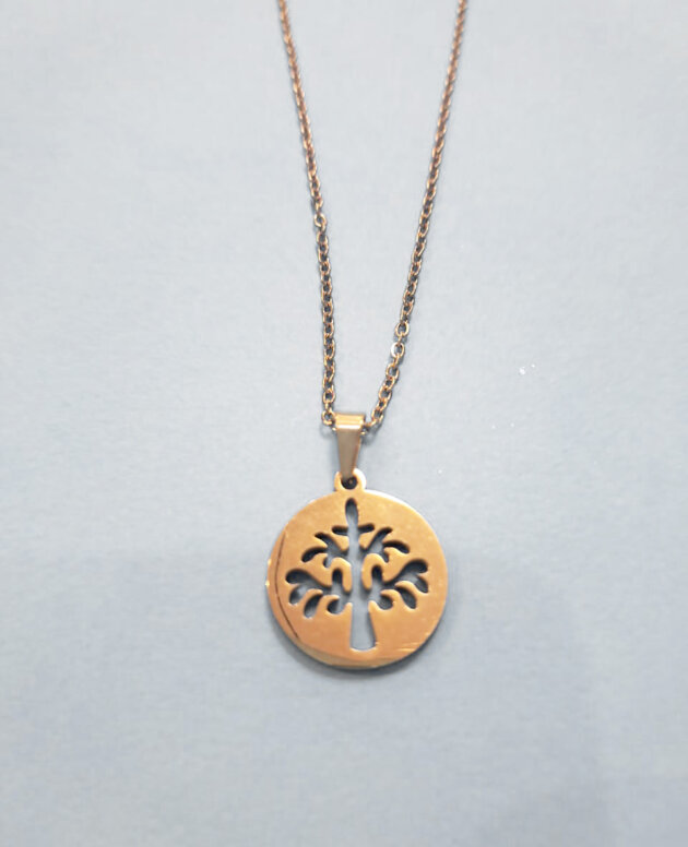 Gold stainless steel cut out tree in circle